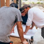 a group of men working on a project